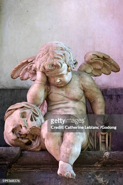 the weeping angel. nicolas blasset (1636) in the mausoleum of canon guillain lucas. amiens cathedral. - mourning stock pictures, royalty-free photos & images