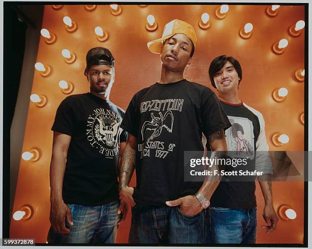 Sheldon Shay Haley, Pharrell Williams and Chad Hugo) are photographed for Request Magazine in 2002.