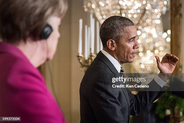 President Barack Obama meets with German Chancellor Angela Merkel in the East Room of the White House Monday February 9, 2015. Obama and Merkek met...