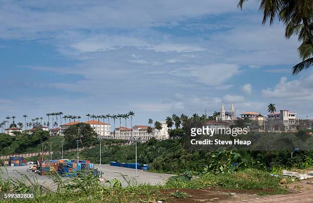presidential palace and old spanish cathedral with containers in foreground in skyline of the capital city of malabo, equatorial guinea, africa - guine equatorial imagens e fotografias de stock