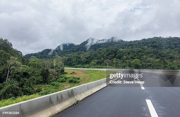 modern motorway between bata and mongomo and the new city of oyala in equatorial guinea - equatorial guinea stock pictures, royalty-free photos & images