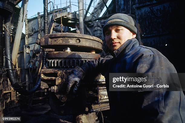 Worker in one of the oil fields of Jangaozen. With more than 63 000 tons of oil extracted per year in Kazakhstan, the country became the second...