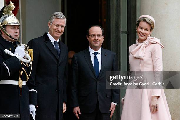 King Philippe of Belgium and Queen Mathilde of Belgium meet French president Francois Hollande during a one day official visit to Paris at the Elysee...