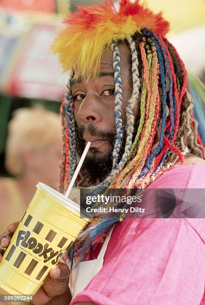 George Clinton stops for a drink during the filming of a music video in Van Nuys, California.