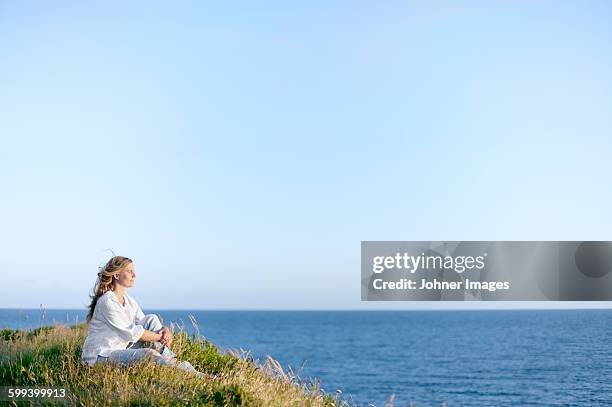 woman relaxing at sea - varberg stock pictures, royalty-free photos & images