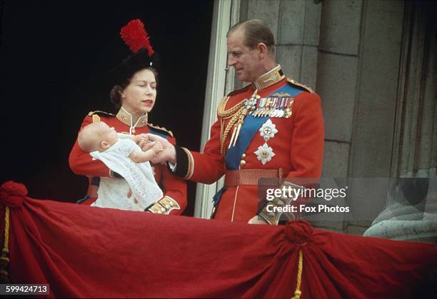 Queen Elizabeth II and Prince Philip with their baby son, Prince Edward on the balcony at Buckingham Palace, during the Trooping of the Colour,...