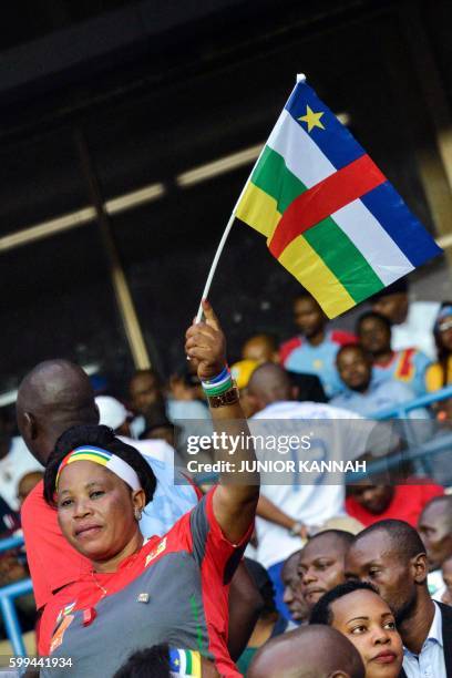 Central African Republic's supporters cheer their team during the 2017 African Cup of Nations qualifying football match between Democratic Republic...