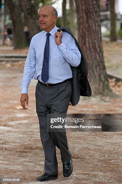 Alain Juppe, Mayor of Bordeaux and Les Republicains presidential candidate hopeful takes a walk after a press conference at Bordeaux metropole on...