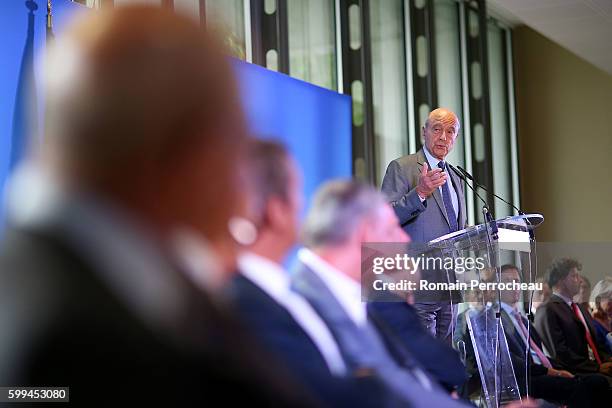 Alain Juppe, Mayor of Bordeaux and Les Republicains presidential candidate hopeful speaks during a press conference at Bordeaux metropole on...