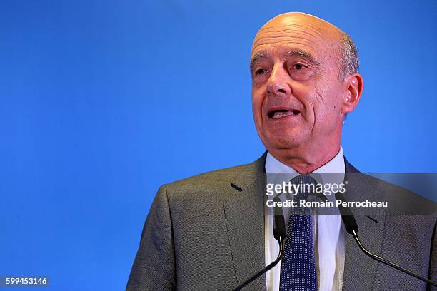 Alain Juppe, Mayor of Bordeaux and Les Republicains presidential candidate hopeful speaks during a press conference at Bordeaux metropole on...