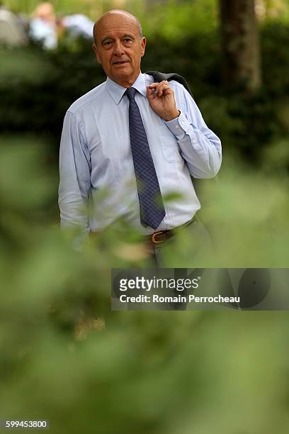 Alain Juppe, Mayor of Bordeaux and Les Republicains presidential candidate hopeful takes a walk after a press conference at Bordeaux metropole on...