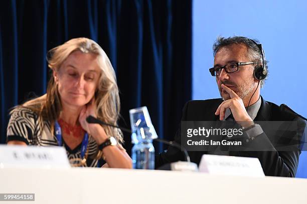 Jaeger LeCoultre Communications Director Laurent Vinay listens as director Amir Naderi speaks during the press conference for 'Mountain' and before...
