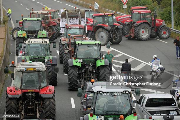 French farmers blockade the main A16 motorway into the Channel Tunnel terminal protesting against the Jungle migrant camp on September 5, 2016 in...