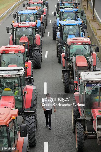 French farmers, blockade the main A16 motorway into the Channel Tunnel terminal protesting against the Jungle migrant camp on September 5, 2016 in...