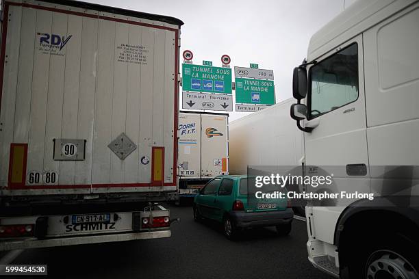 French farmers, truckers and local business owners blockade the main A16 motorway into the Channel Tunnel terminal protesting against the Jungle...