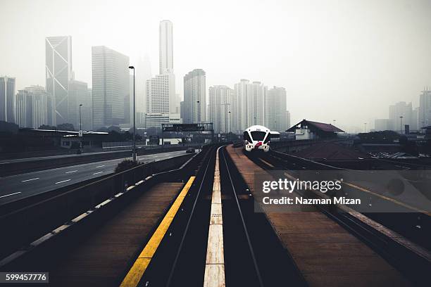 a city skyline was covered by thick haze. - air quality stock pictures, royalty-free photos & images