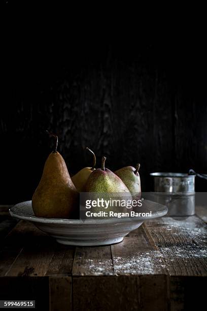 Pears On A Wood Table