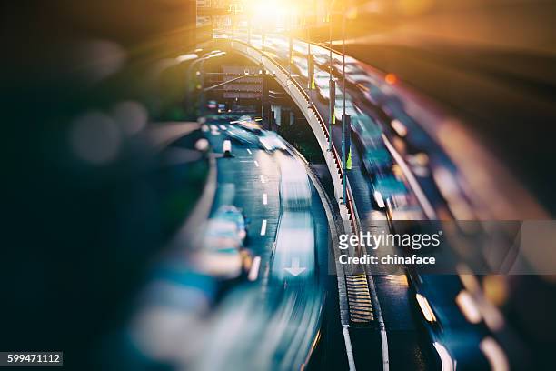 blurred traffic  in central district - transportation imagens e fotografias de stock