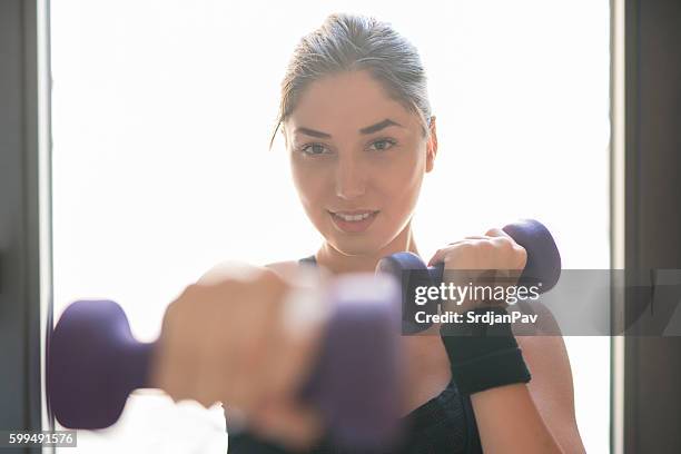 stay strong! - bent arm stock pictures, royalty-free photos & images