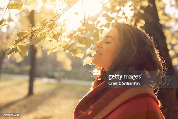 ein teil der natur sein - woman in a shawl stock-fotos und bilder