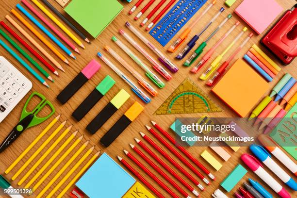 office and school supplies arranged on wooden table - knolling - school supplies stock pictures, royalty-free photos & images