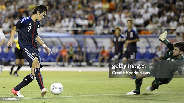 Japan - Tokyo Verdy striker Kenyu Sugimoto of Japan scores the first goal in the second half of an U-23 international friendly against New Zealand at...