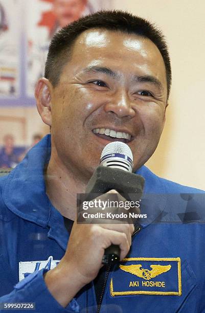 Kazakhstan - Japanese astronaut Akihiko Hoshide speaks during a press conference in Baikonur, Kazakhstan, on July 13, 2012. He will board Russia's...