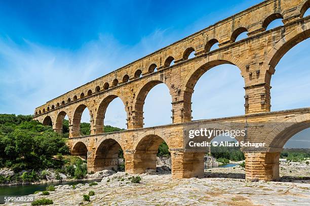 pont du gard aqueduct in southern france - pont du gard aqueduct stock pictures, royalty-free photos & images