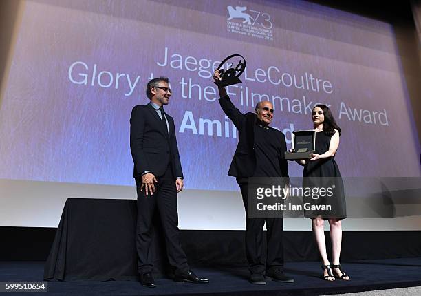 Jaeger LeCoultre Communications Director Laurent Vinay presents director Amir Naderi the Jaeger Le Coultre Glory To The Filmmaker Award on stage at...
