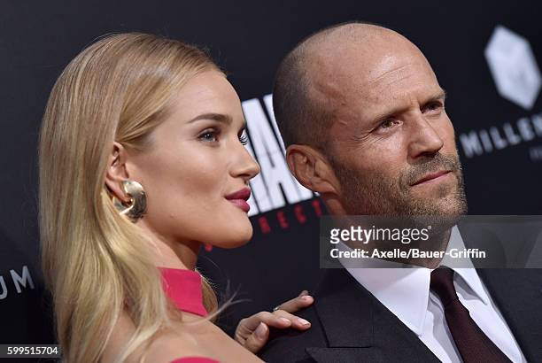 Actress/model Rosie Huntington-Whiteley and actor Jason Statham arrive at the premiere of Summit Entertainment's 'Mechanic: Resurrection' at ArcLight...