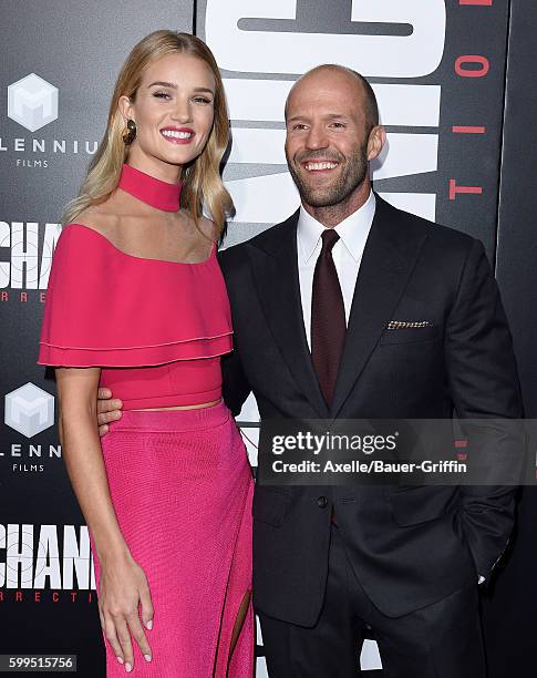 Actress/model Rosie Huntington-Whiteley and actor Jason Statham arrive at the premiere of Summit Entertainment's 'Mechanic: Resurrection' at ArcLight...