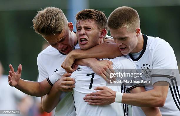 Mats Koehlert of Germany jubilates with Nicklas Shipnoski and Dzenis Burnic after scoring the second goal during the international friendly match...