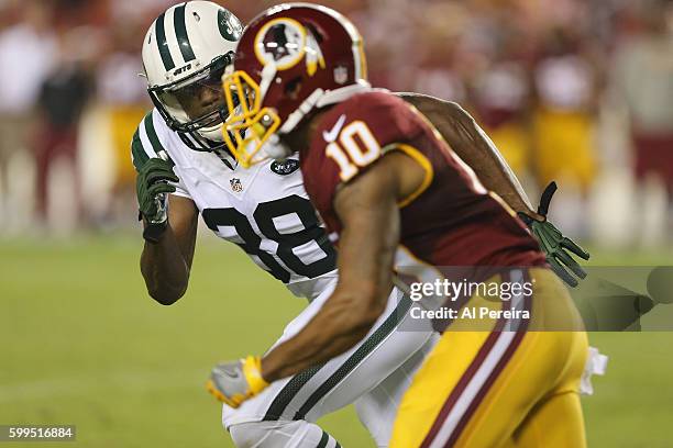 Cornerback Juston Burris of the New York Jets follows his man against the Washington Redskins at FedExField on August 19, 2016 in Landover, Maryland.