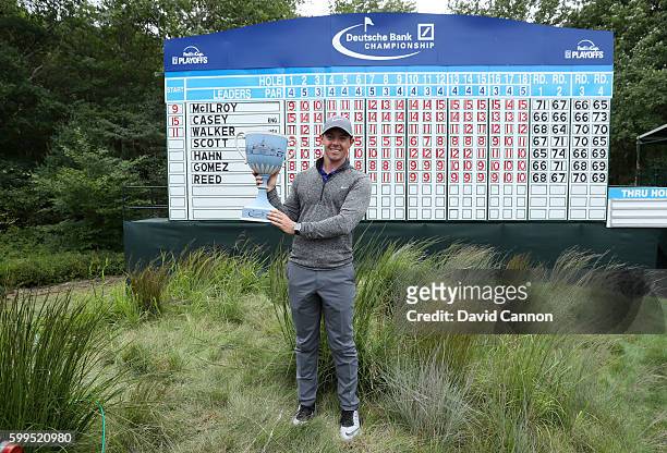 Rory McIlroy of Northern Ireland poses with the trophy during the final round of the Deutsche Bank Championship at TPC Boston on September 5, 2016 in...
