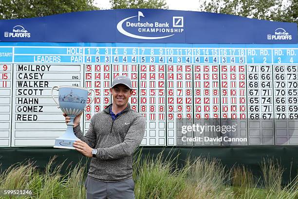 Rory McIlroy of Northern Ireland poses with the trophy during the final round of the Deutsche Bank Championship at TPC Boston on September 5, 2016 in...