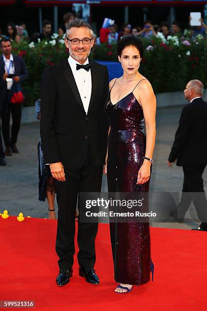 Laurent Vinay and Olga Sutulova attend the premiere of 'Piuma' during the 73rd Venice Film Festival at Sala Grande on September 5, 2016 in Venice,...