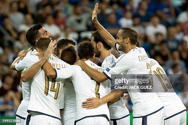 Italy's players celebrate after scoring a goal during their World Cup 2018 qualification match between Israel and Italy at the Sammy Ofer Stadium in...