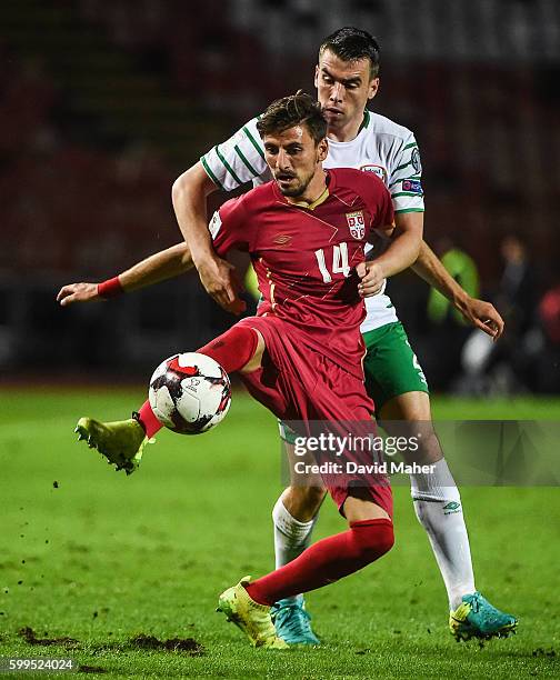 Belgrade , Serbia - 5 September 2016; Seamus Coleman of Republic of Ireland in action against Filip Mladenovic of Serbia during the FIFA World Cup...