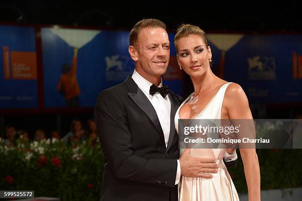 Rocco Siffredi and Rosa Caracciolo attend the premiere of 'Rocco' during the 73rd Venice Film Festival at Sala Perla on September 5, 2016 in Venice,...