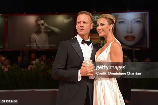 Rocco Siffredi and Rosa Caracciolo attend the premiere of 'Rocco' during the 73rd Venice Film Festival at Sala Perla on September 5, 2016 in Venice,...