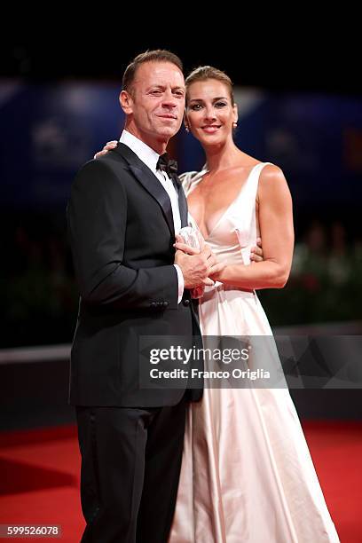 Rocco Siffredi and Rosa Caracciolo attend the premiere of 'Rocco' during the 73rd Venice Film Festival at Sala Perla on September 5, 2016 in Venice,...