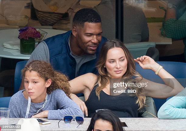 Michael Strahan with 2 daughters and girlfriend Kayla Quick at USTA Billie Jean King National Tennis Center on September 5, 2016 in the Queens...