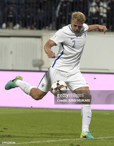 Paulus Arajuuri of Finland scores a goal during the World Cup 2018 qualifying football match Finland vs Kosovo on September 5, 2016 in Turku. / AFP...