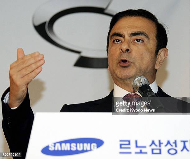 South Korea - Carlos Ghosn, chief executive officer of Nissan Motor Co. And the alliance of Nissan and Renault SA, attends a press conference in...