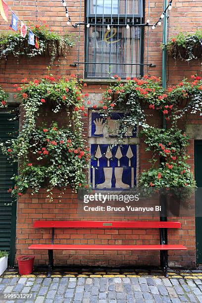 flowers decorated street of commercial court - belfast foto e immagini stock