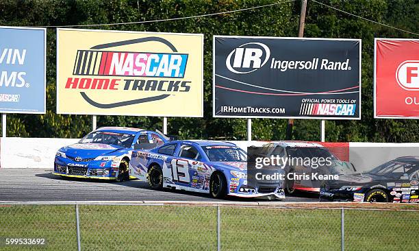 Hunter Baize driver the Bicycle Playing Cards/Pine Mountain Firedogs and Enrique Baca driver of the Rev Racing Toyota along with Spencer Davis driver...
