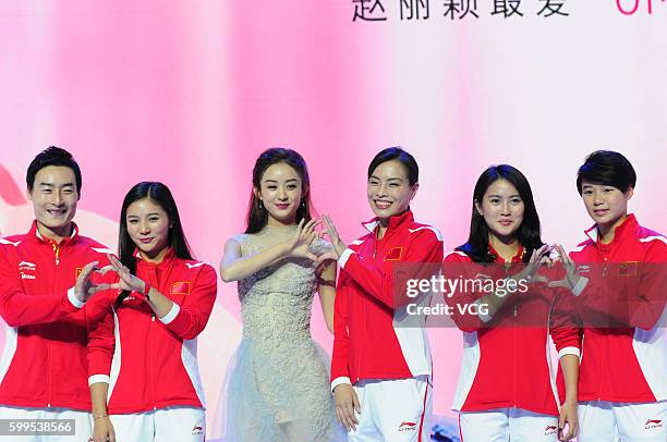 Chinese diver Zou Kai, diver He Zi, actress Zhao Liying, diver Wu Minxia, diver Chen Ruolin and diver Shi Tingmao attend Chando activity on September...