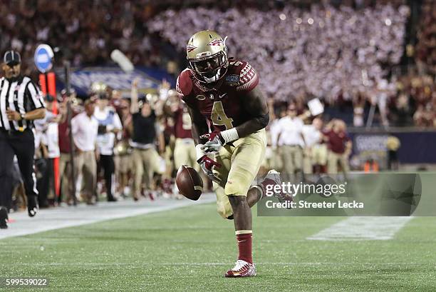 Dalvin Cook of the Florida State Seminoles fumbles the ball near the goal line in the second quarter against the Mississippi Rebels during the...