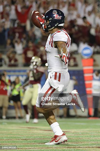 Evan Engram of the Mississippi Rebels celebrates scoring a touchdown in the second quarter against the Florida State Seminoles during the Camping...