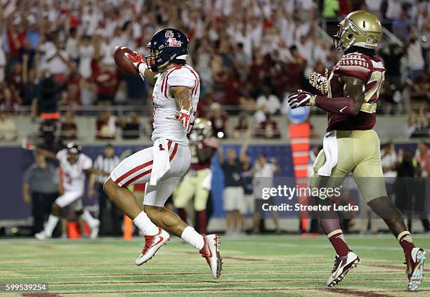 Evan Engram of the Mississippi Rebels celebrates scoring a touchdown in the second quarter against the Florida State Seminoles during the Camping...